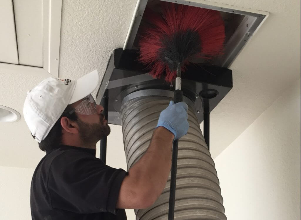 Professional air duct cleaning improving indoor air quality