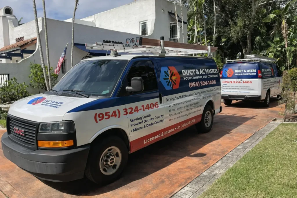 HVAC technician performing air duct inspection and cleaning service